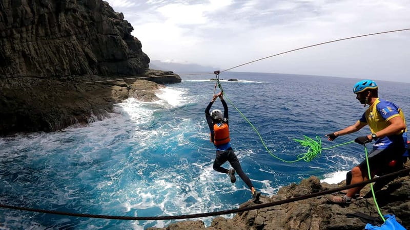 Agaete: Gran Canaria Coasteering. Marine Ferrata and Zipline - The cliff hike to an ancient aboriginal cave