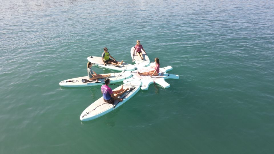 Arguineguín: Stand-up Paddleboard Yoga Class with Instructor - Gear and safety: leash, lycra, and first-responder training