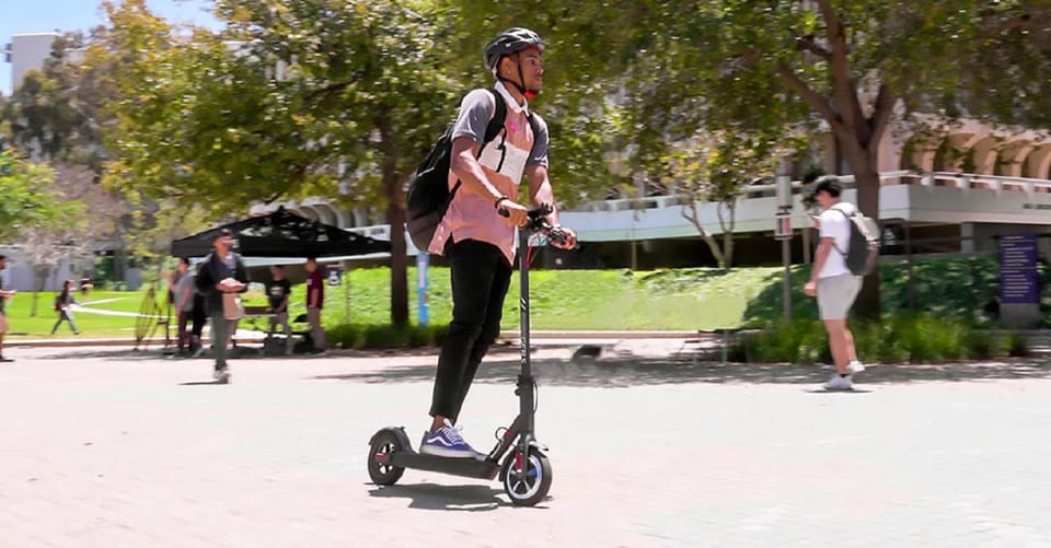e-Scooter Step Kickstart Guided Tour: Sightseeing Maspalomas - Meloneras black-sand beach: volcanic shore vibes and a local bar stop