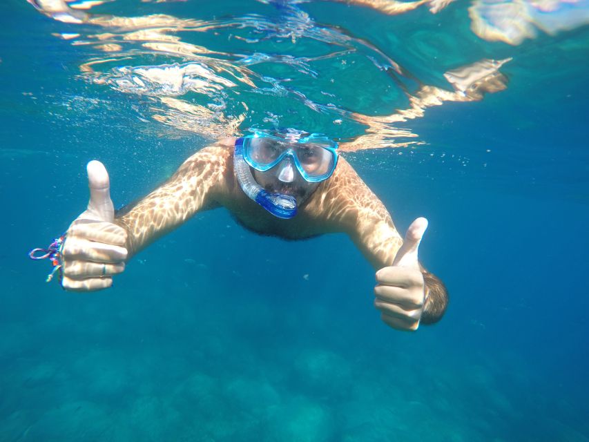 Explore Gran Canaria: Boat Tour with Wine & Food Tasting - Coastline views: cliffs, beaches, and quiet stretches near Mogán