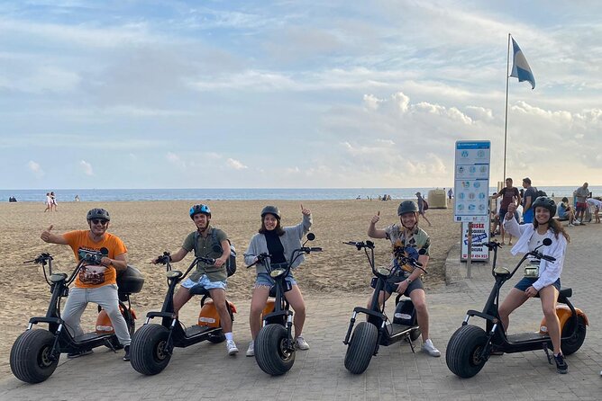 Rent e-Scooter 2 seater from 1 untill 4 Hour : Explore Maspalomas - Playa del Inglés: where you trade dunes for people-watching